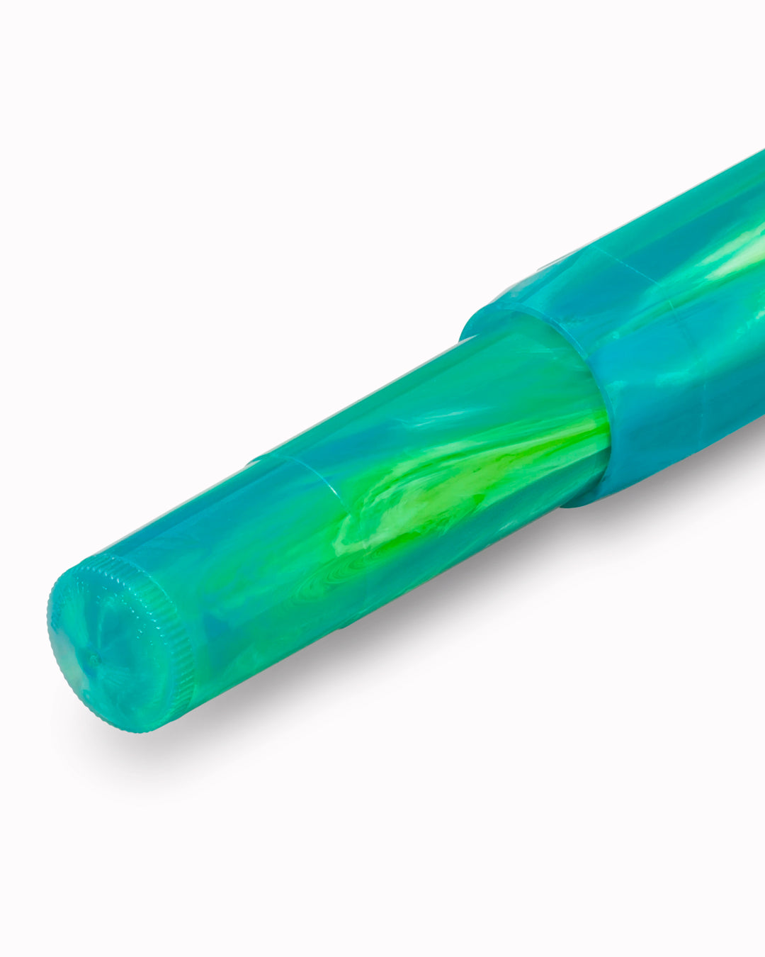 The Kaweco COLLECTION Fountain Pen in Marble Ocean combines deep blue and green tones in a marbled finish, with each pen carrying a slightly different pattern. 