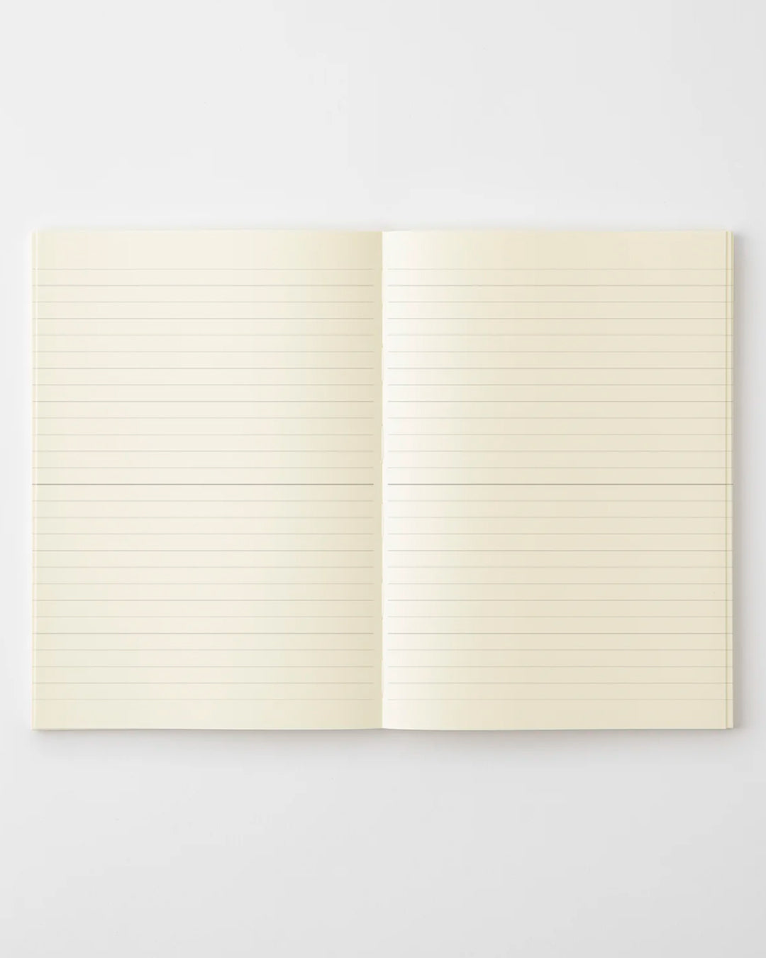 A5 ruled paper notebook with a simple and clean off white cover and embossed MD Paper logo.