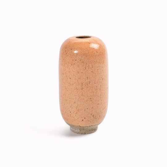 The Orange&nbsp;Mamey Sapote&nbsp;design is hand-thrown in watertight stoneware. Due to the rounded taper at the top of the vase