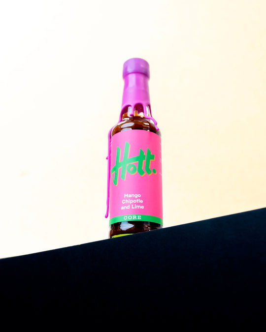 A mango-led hot sauce built around smoked chipotle and bright lime. Sweet fruit at the front, then a steady build of warmth that moves into a deeper, smoky finish.