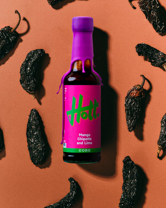 A mango-led hot sauce built around smoked chipotle and bright lime. Sweet fruit at the front, then a steady build of warmth that moves into a deeper, smoky finish.