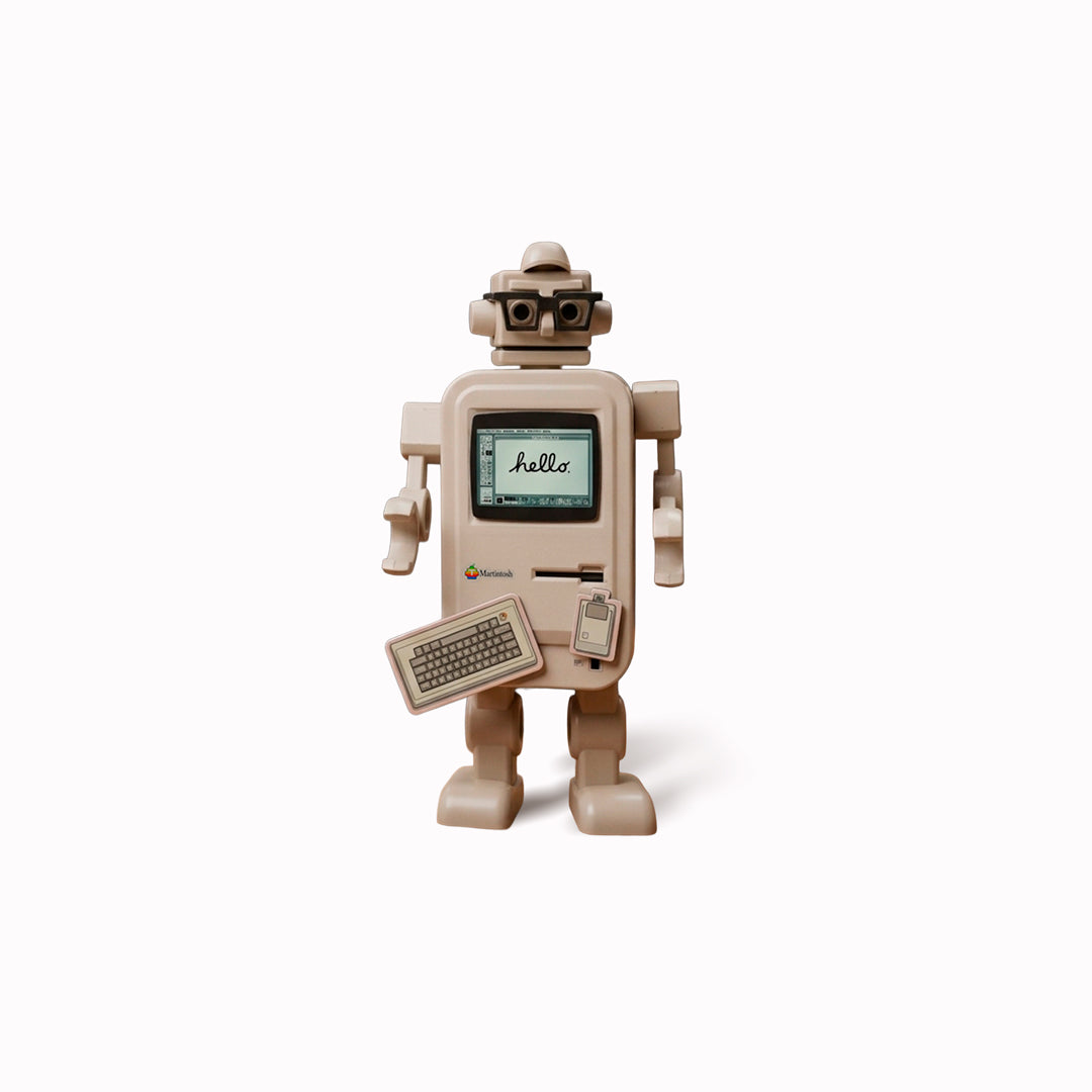 Tin-Bot is a unique collectible series of small aluminium storage tins that also have magnetic arms, legs and head that turn them into posable desktop robots. Each one has roots in nostalgic popular culture.