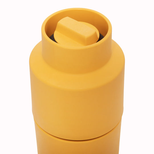 A rich yellow coloured Danish designed Billund spice grinder from CrushGrind is a 12cm tall upside-down grinder with a powerful ceramic grinding module that makes easy work of grinding salt, pepper, dried herbs and most spices.