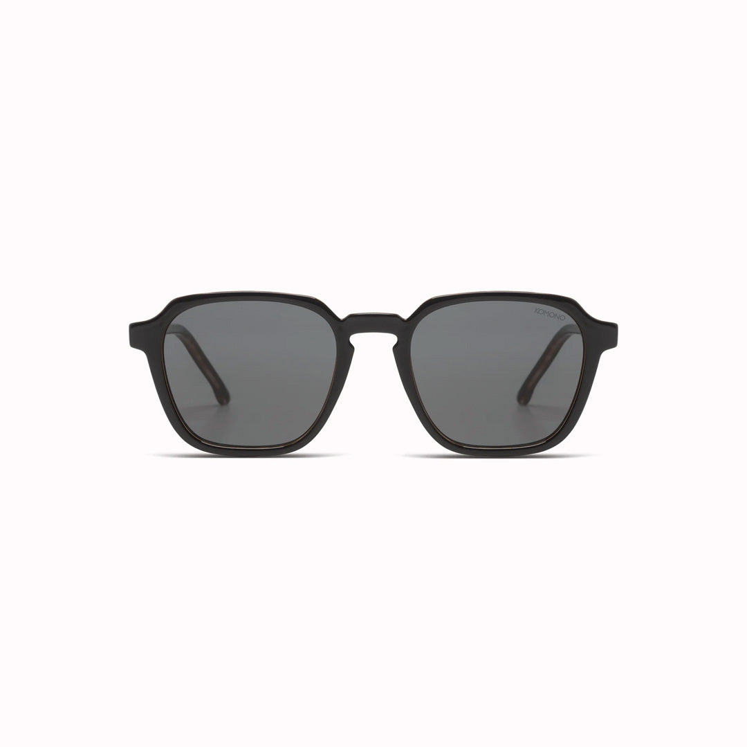 The Matty is an elegant frame with rectangular shaped lenses, and is a great shape to fit all kinds of faces. The frame is measured at a Medium size. These sunglasses are unisex, so are suitable for both men and women.  With a striking black frame edged with tortoiseshell, the Matty Black Tortoise is both modern and classic. A great look. 