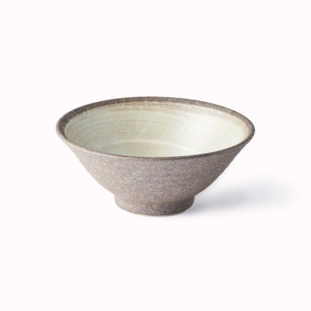 Stunning bowl from Made in Japan with featuring earthy brown glaze with a circular sweep of golden ochre.