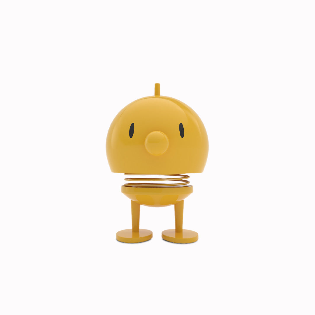 Springy and cheerful! Bumble by Hoptomist is the classic 1960's home decor, happy ornamental figurine in a colourful yellow finish. 