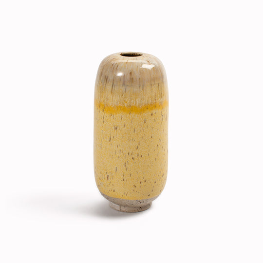 The Melting Daisy&nbsp;design is hand-thrown in watertight stoneware. Due to the rounded taper at the top of the vase