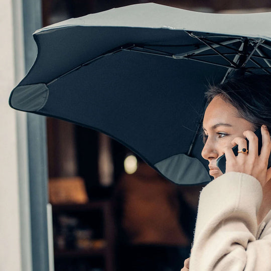Crafted for portability and resilience, the Metro folding umbrella from Blunt is engineered to withstand challenging weather conditions.