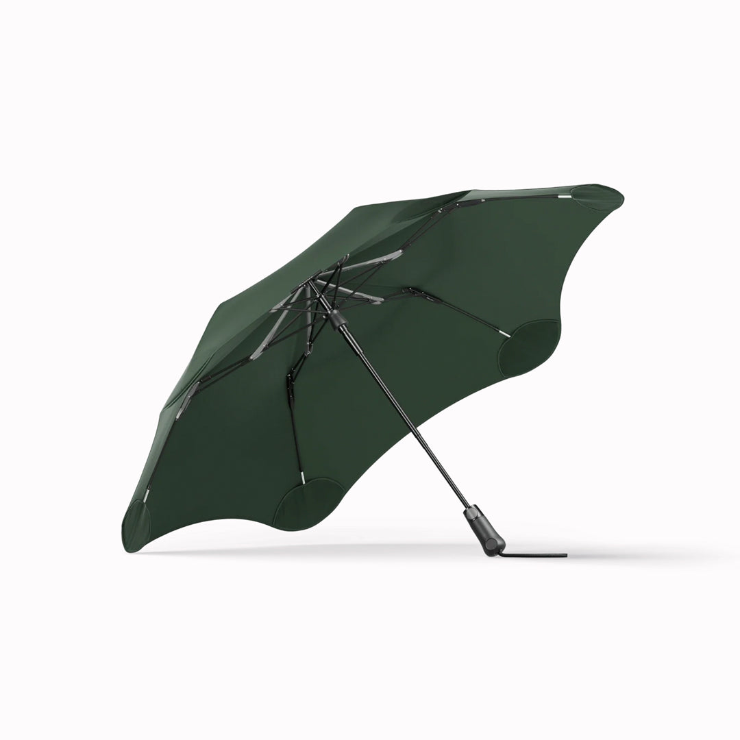 Crafted for portability and resilience, the Metro folding umbrella from Blunt is engineered to withstand challenging weather conditions.