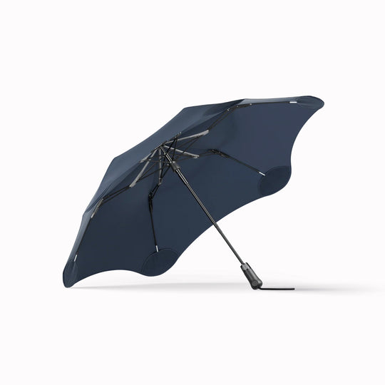Crafted for portability and resilience, the Metro folding umbrella from Blunt is engineered to withstand challenging weather conditions.