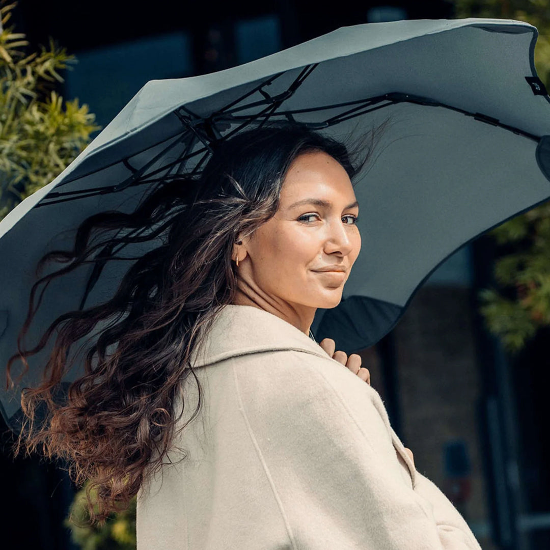 Crafted for portability and resilience, the Metro folding umbrella from Blunt is engineered to withstand challenging weather conditions.