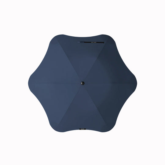 Crafted for portability and resilience, the Metro folding umbrella from Blunt is engineered to withstand challenging weather conditions.