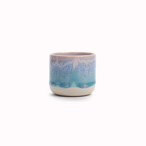 The pale blue over pink glaze Miami Sip Cup - Danish/Japanese mix up with this thick glazed, hand made ceramic small beaker from Studio Arhoj's Tokyo Series.
