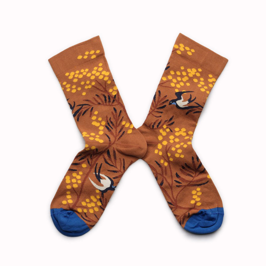 This Fruits Sage pair of mid-calf length socks is from the Minos collection