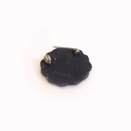 Hand-embroidered Mini Daisy lapel pin by Parisian fashion accessory brand Macon et Lesquoy. Measuring approximately 30mm by 30mm, the mini daisy brooch is part of their 'Timeless Creations' Collection
