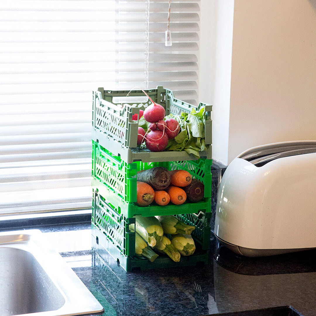 Safe for use in the kitchen. Folding Crate from Aykasa. This crate is made from 100% recyclable material and can be folded flat when not in use. It's perfect for holding books, toys, clothes, or anything else you want to organise. 