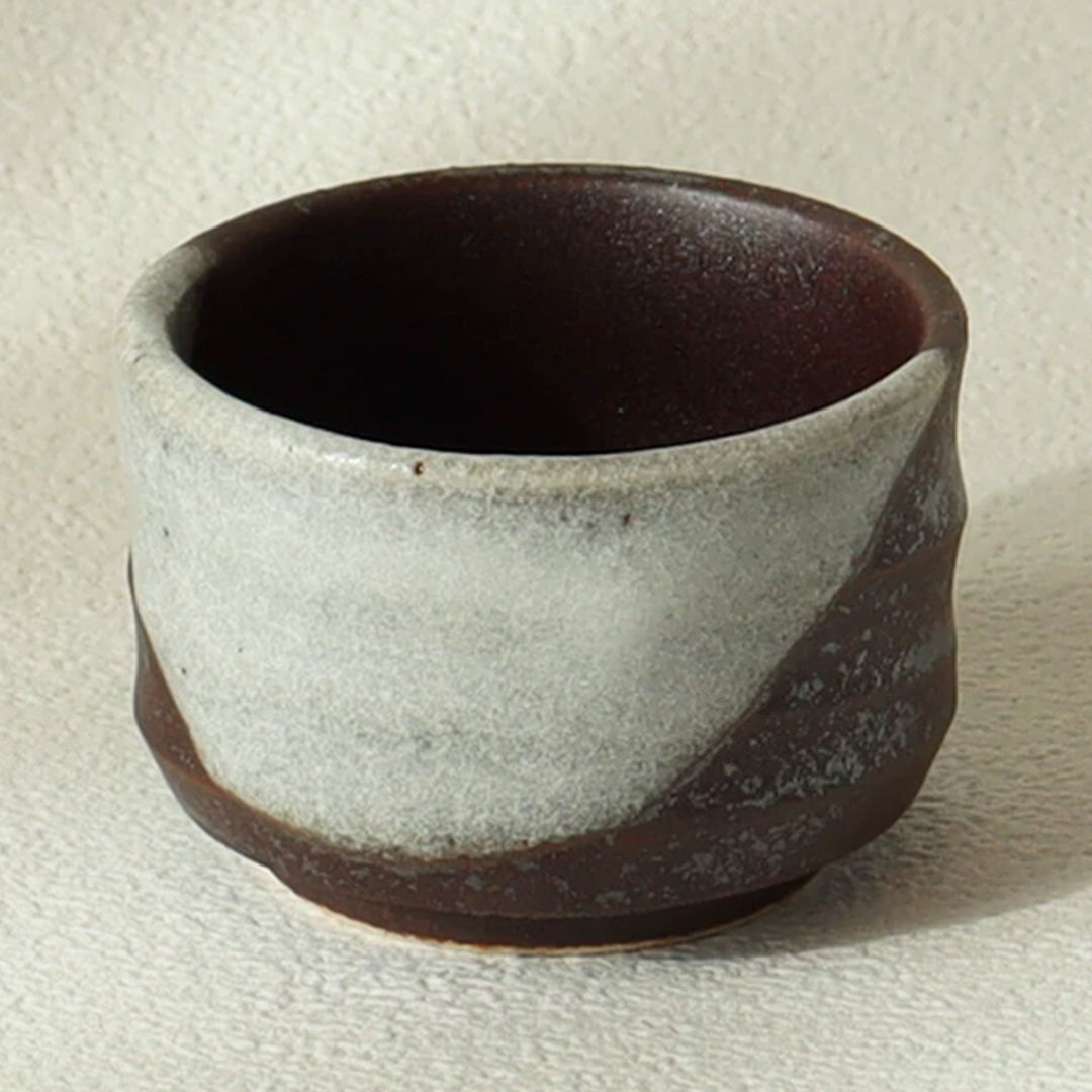 A larger sized sake cup holding 80ml liquid from Gifu prefecture in Japan.