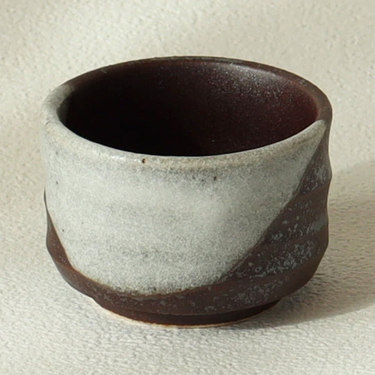 A larger sized sake cup holding 80ml liquid from Gifu prefecture in Japan.