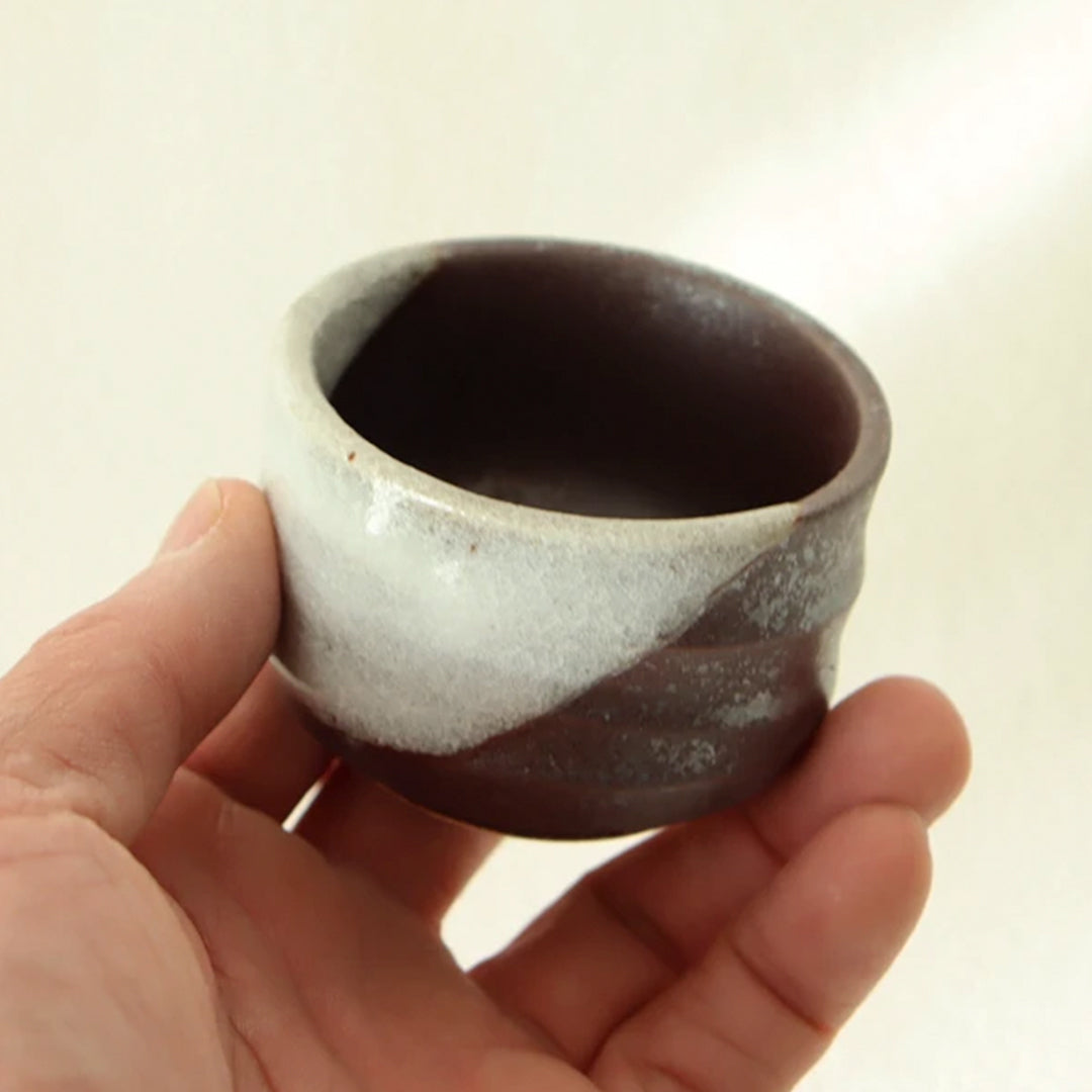 A larger sized sake cup holding 80ml liquid from Gifu prefecture in Japan.