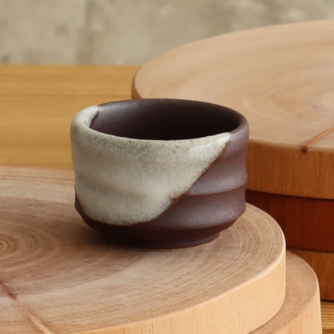 A larger sized sake cup holding 80ml liquid from Gifu prefecture in Japan.