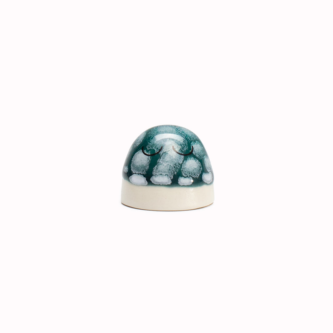 The smallest of the Arhoj decorative ornament figurine family, these tiny little cute dots still have all the personality of their larger siblings. Colourful and handmade in Copenhagen, they have all the Arhoj trademarks with their thick multi coloured glazes and Japanese ceramic influence.