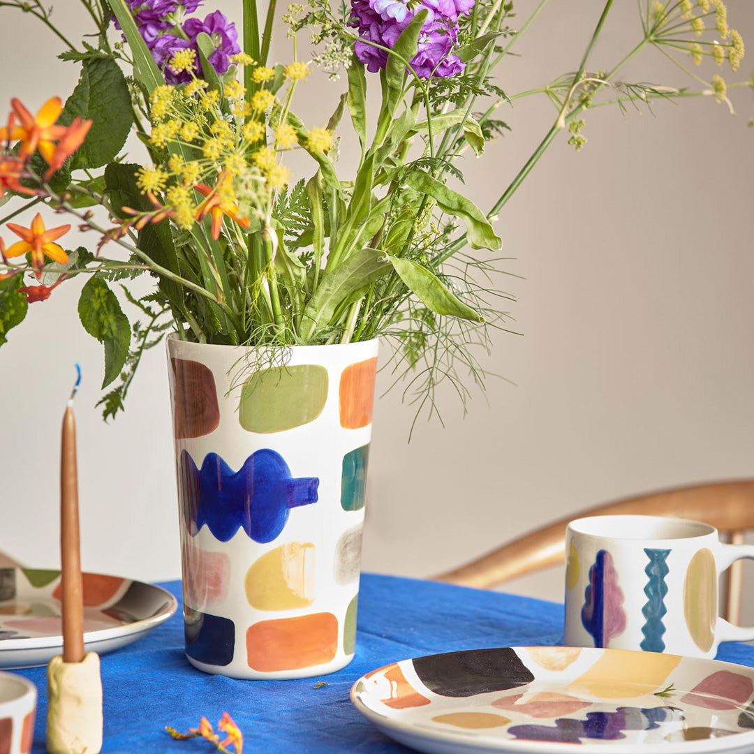 Crafted from high-quality stoneware, each piece is hand-painted in Portugal, making every vase unique.