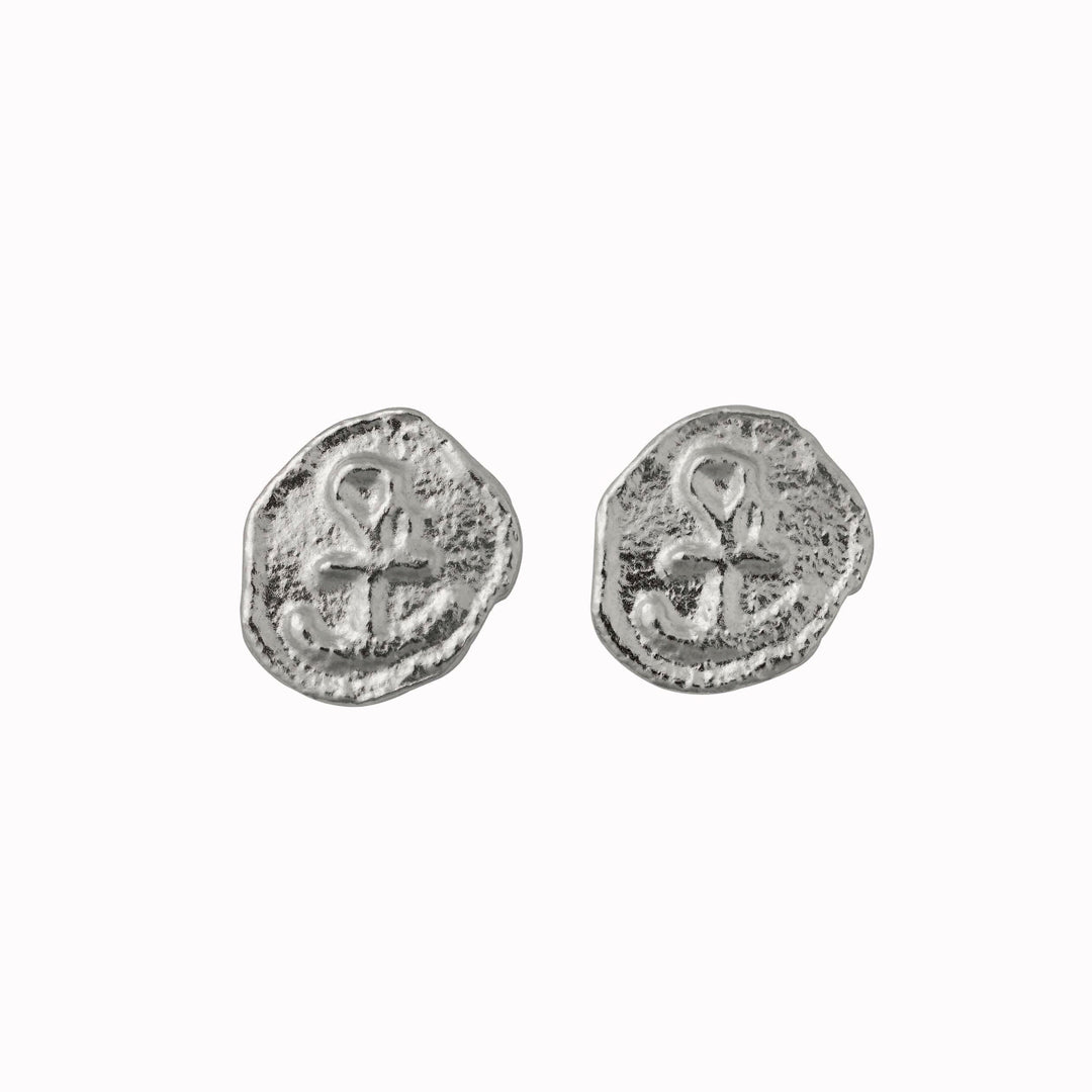 The Mudlarked Anchor Token Stud Earrings are available in 22ct gold plated silver or sterling silver stud earrings.