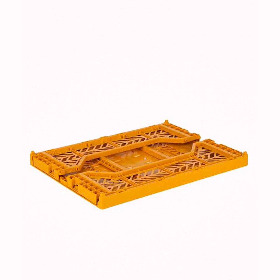 Folded Flat, Mustard/Golden Yellow Folding Crate from Aykasa. This crate is made from 100% recyclable material and can be folded flat when not in use. It's perfect for holding books, toys, clothes, or anything else you want to organise. 