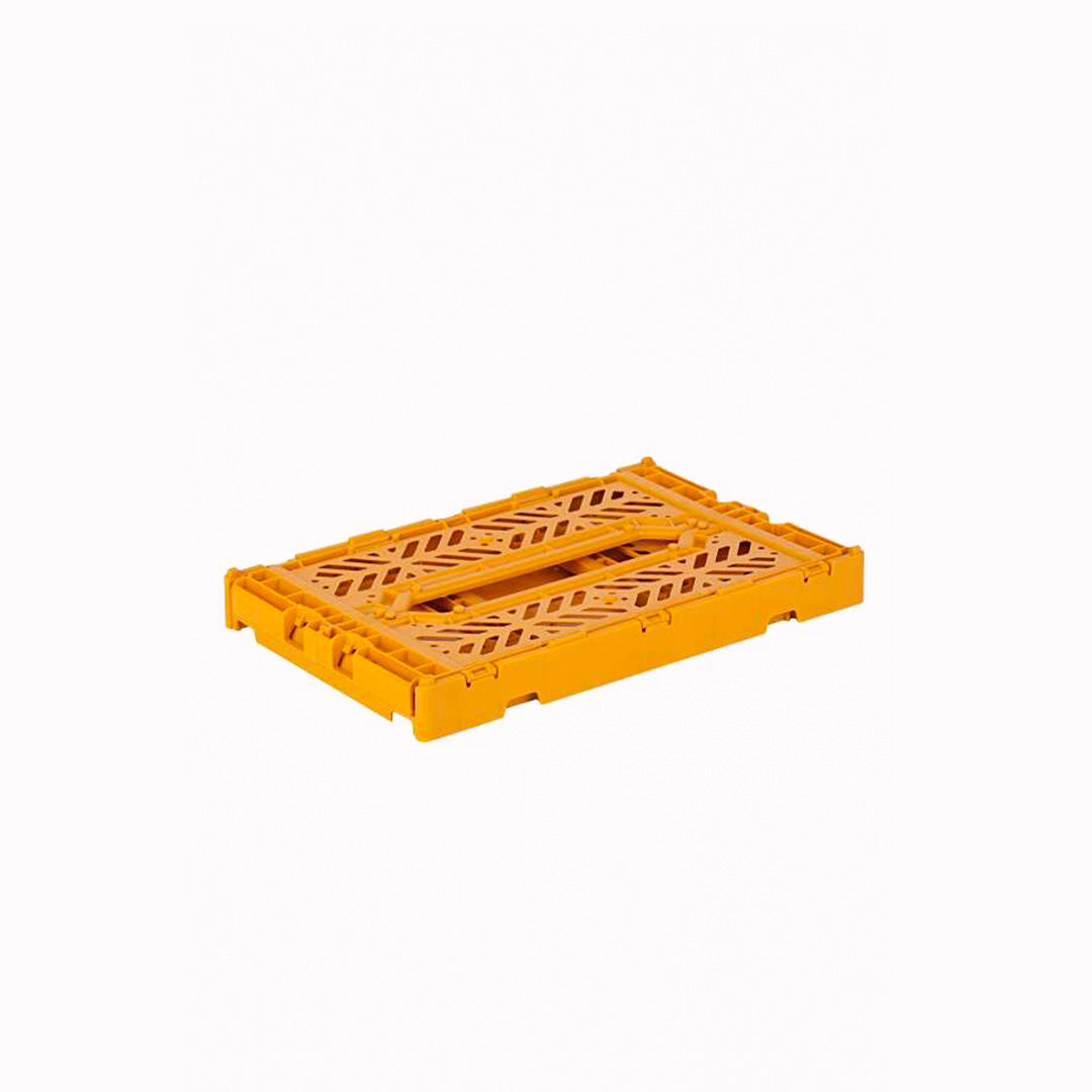 Folded Flat, Mini Mustard/Golden Yellow Folding Crate from Aykasa. This crate is made from 100% recyclable material and can be folded flat when not in use. It's perfect for holding books, toys, clothes, or anything else you want to organise. 