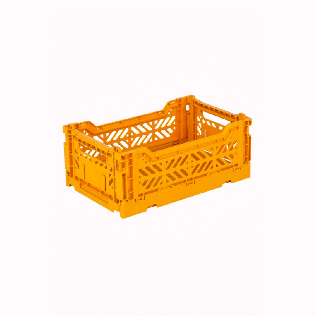 Mini Mustard/Golden Yellow Folding Crate from Aykasa. This crate is made from 100% recyclable material and can be folded flat when not in use. It's perfect for holding books, toys, clothes, or anything else you want to organise. 