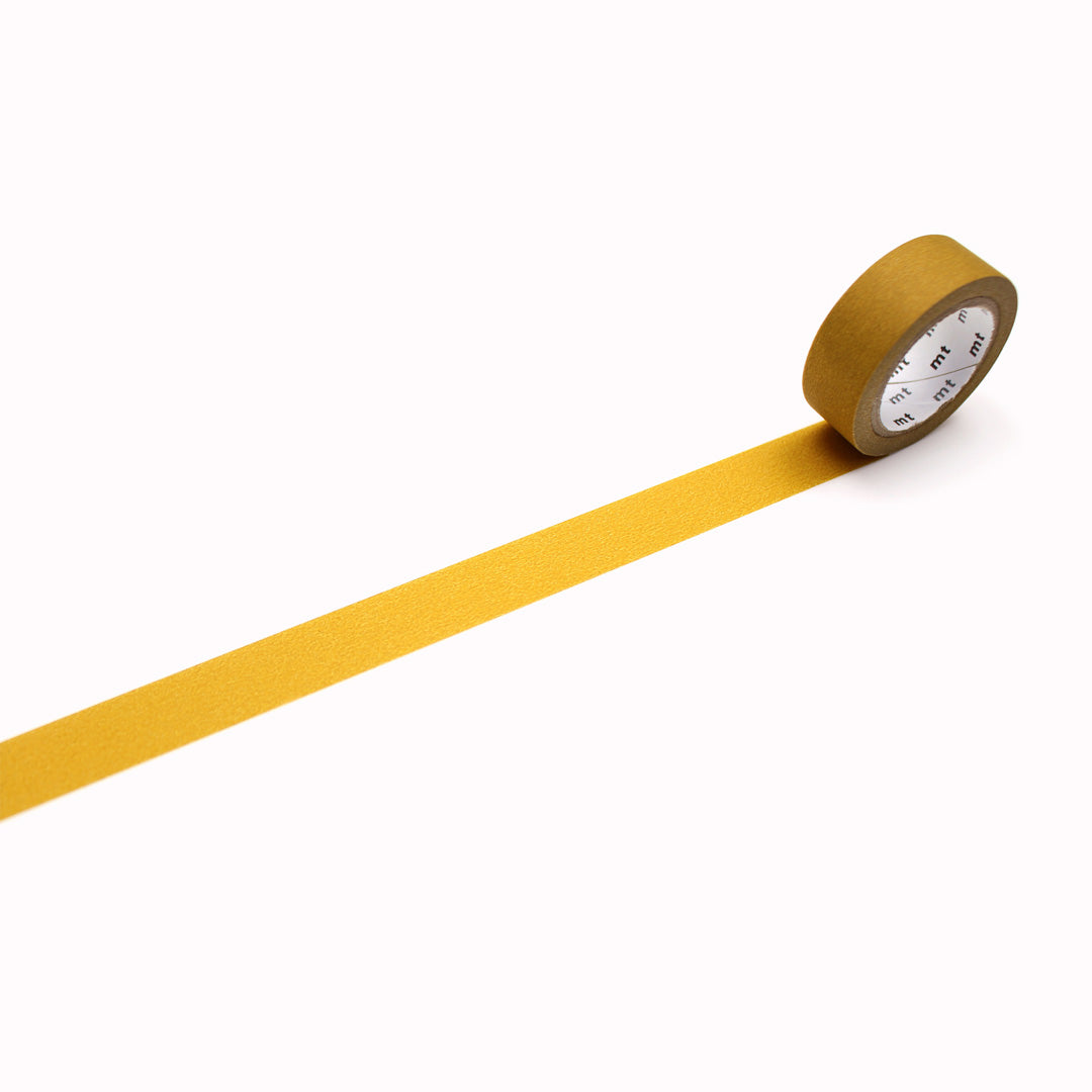 Matte Mustard Washi Tape from MT Tape is a versatile and decorative adhesive tape that can be used for various crafts and projects. It has a deeper yellow matte colour that adds a touch of elegance and sophistication to any surface.