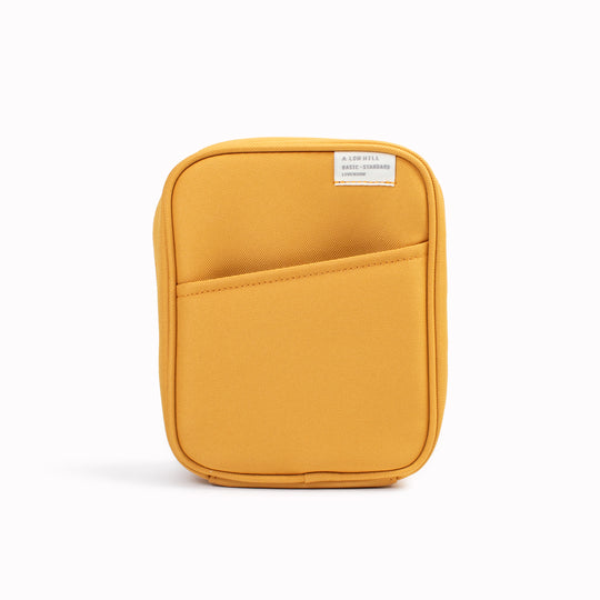 Mustard Yellow pocket cable pouch by Korean stationery brand Livework. Available in a choice of pleasing contemporary colours, the zipped pocket pouch opens up nice and wide, giving easy access to your charger, cables and other small tech items.&nbsp;
