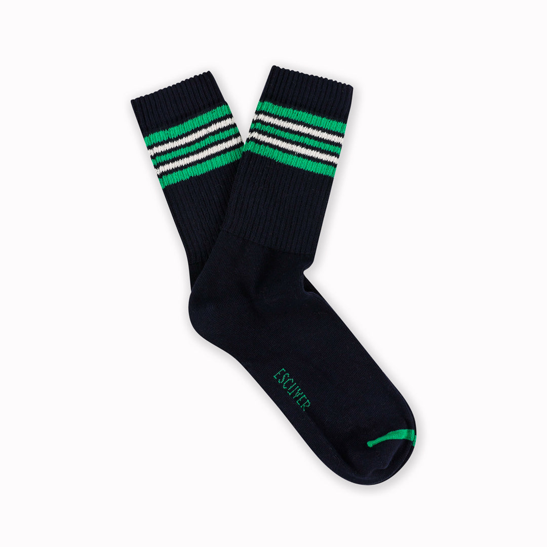 A classic crew sock with a five stripe design in navy blue with green and ecru stripes&nbsp;- a look drawing on vintage athletic styles.