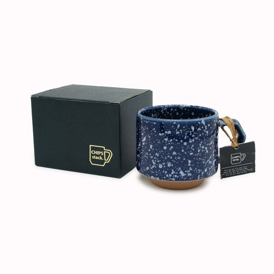 Compact and Easy to hold and stackable for easy storage. This Splash mug has a white glaze playfully sprayed over deep navy with an unglazed base. They are sturdy and comfortable to hold with a unique silhouette.