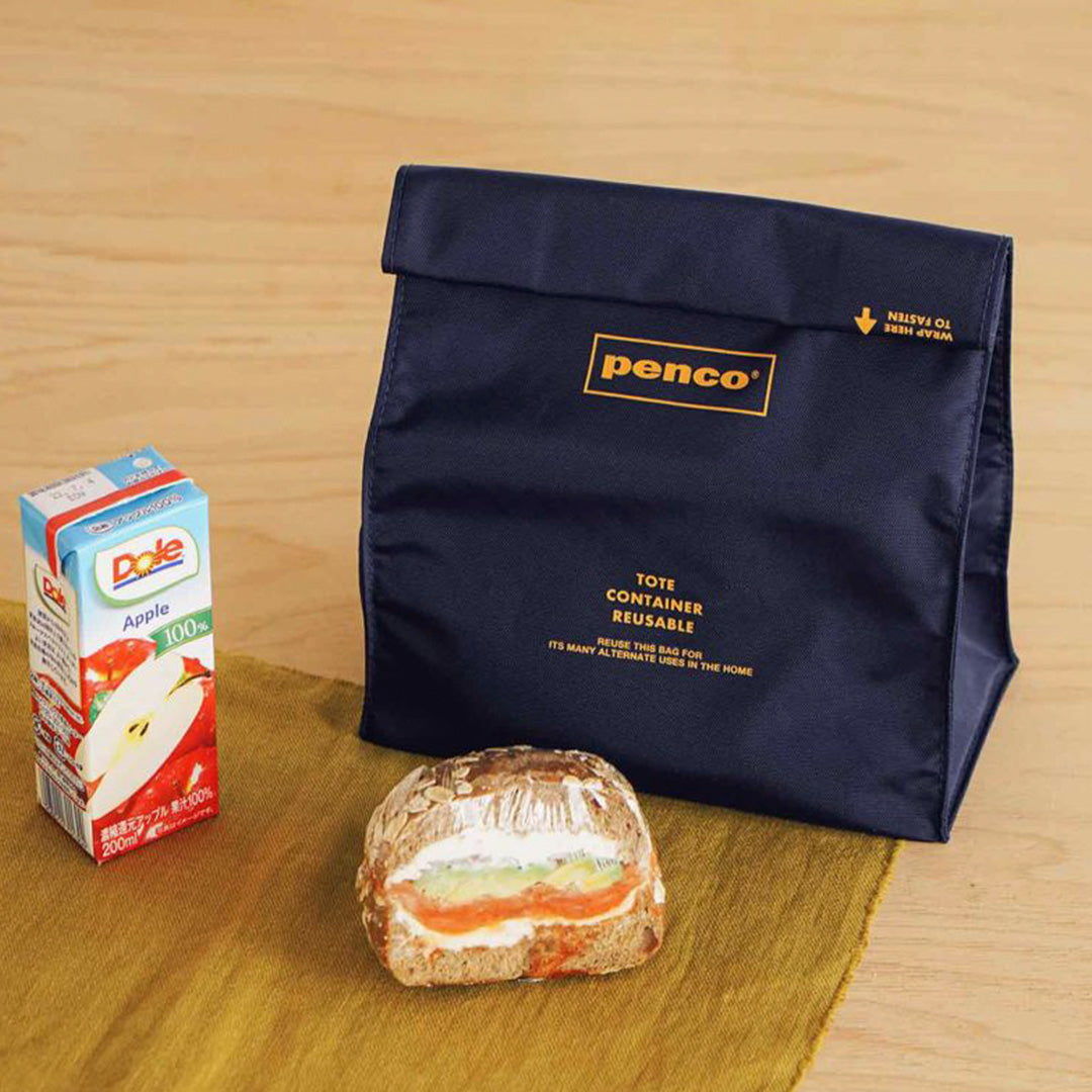 Navy Roll Top Pouch from Penco, offers a convenient seal by rolling up the top similar to a paper bag.