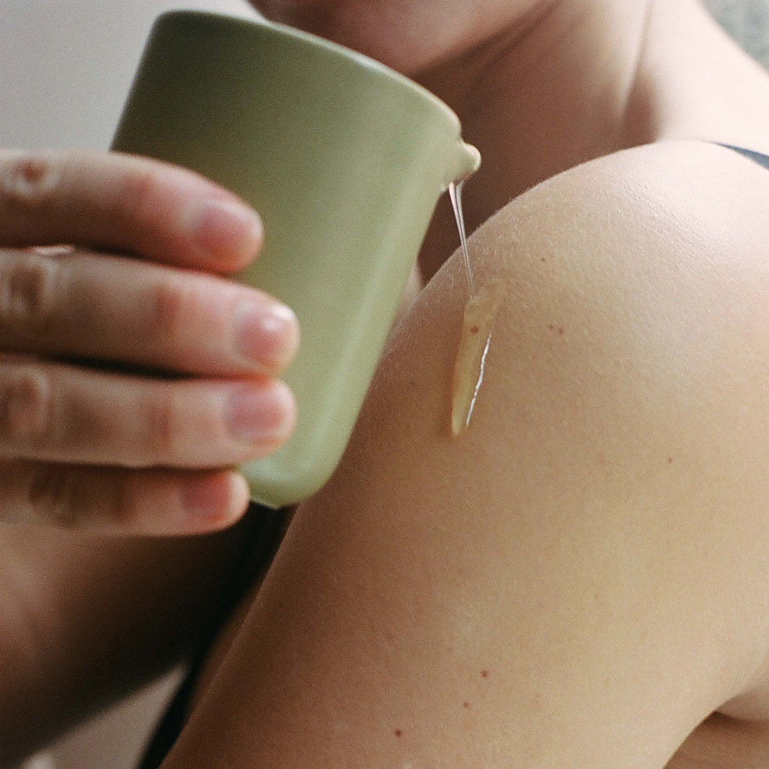 Night Touch is the ultimate mood-setter for a slow evening. This isn't your standard scented candle; it’s a functional piece of self-care designed to melt into a warm, nourishing body oil.