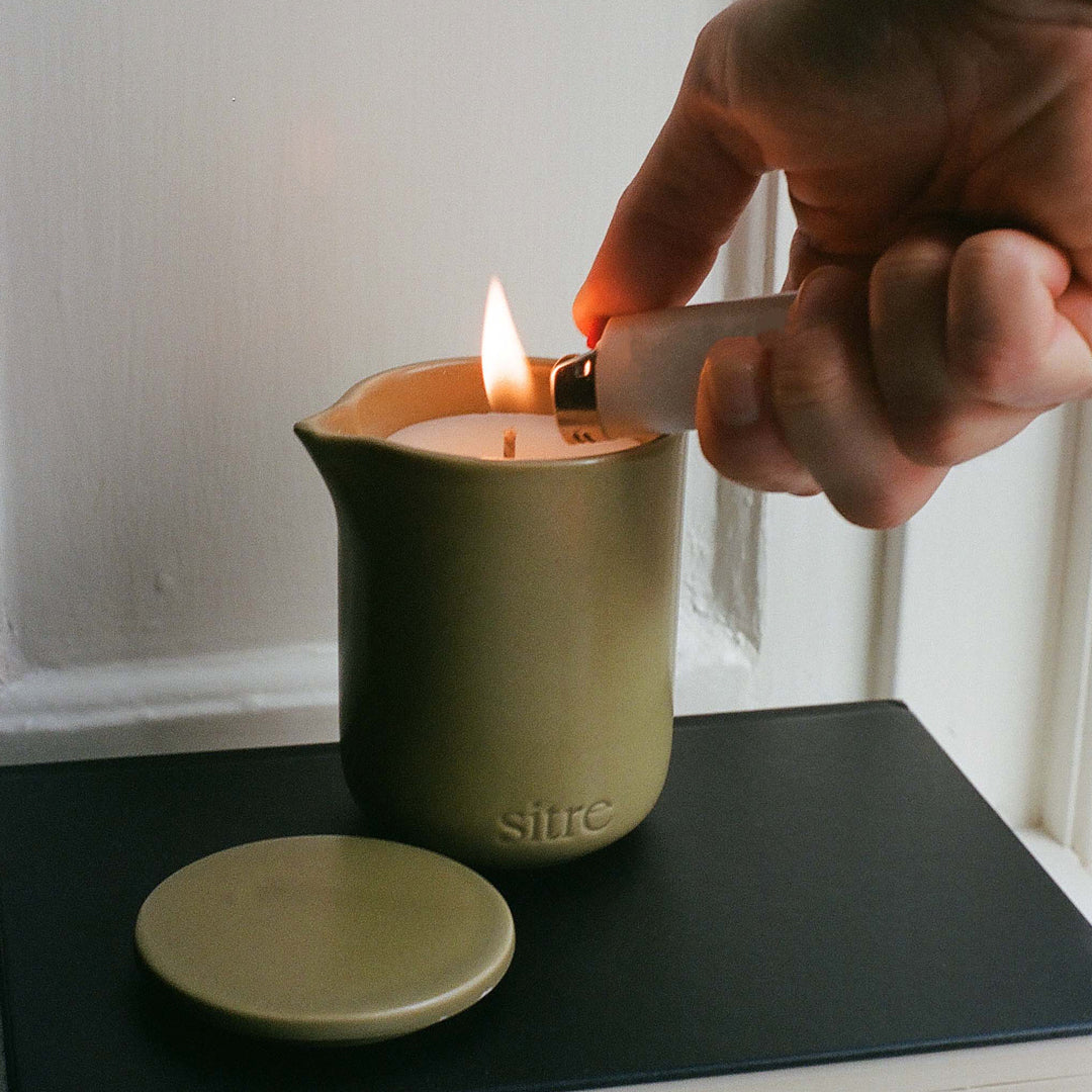 Night Touch is the ultimate mood-setter for a slow evening. This isn't your standard scented candle; it’s a functional piece of self-care designed to melt into a warm, nourishing body oil.