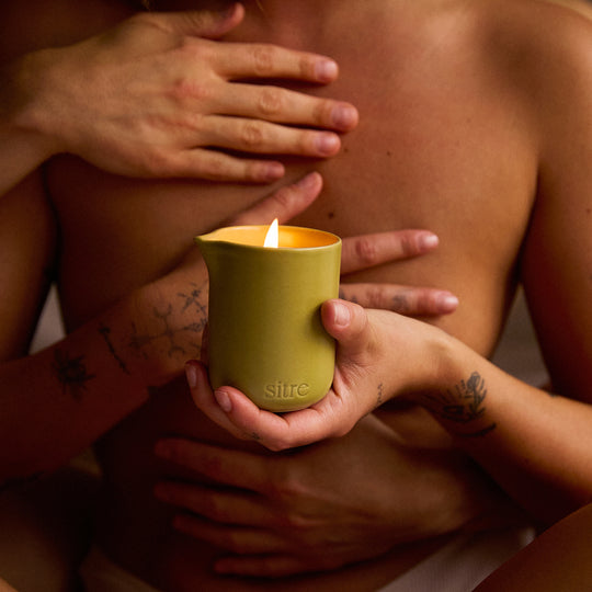 Night Touch is the ultimate mood-setter for a slow evening. This isn't your standard scented candle; it’s a functional piece of self-care designed to melt into a warm, nourishing body oil.
