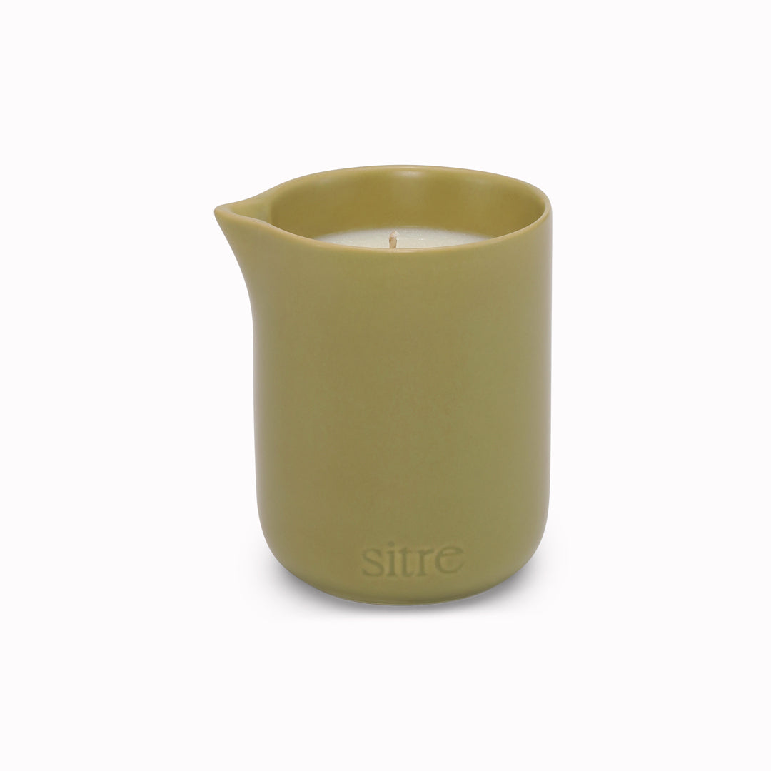 Night Touch is the ultimate mood-setter for a slow evening. This isn't your standard scented candle; it’s a functional piece of self-care designed to melt into a warm, nourishing body oil.