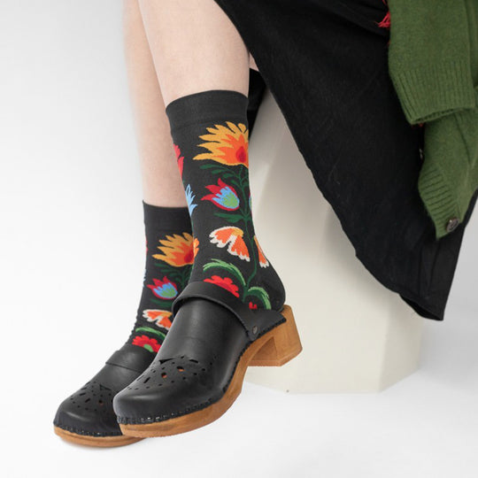 This Bouquet Faux Noir pair of mid-calf length socks is from the AW24 Polka collection