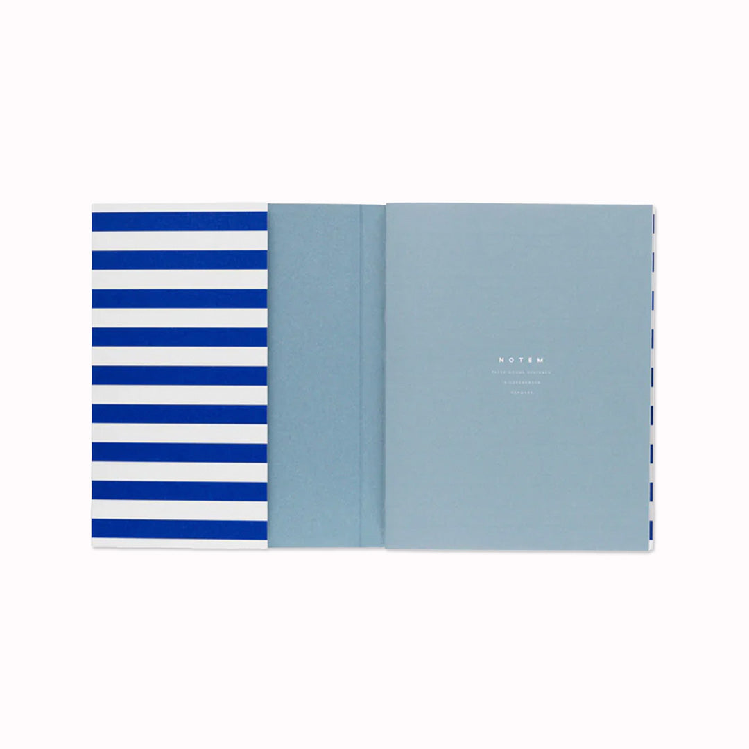 The planner features a minimalist design with a waterproof stripy bright blue and white softcover. The pages are made of high-quality paper that is smooth and acid-free, perfect for writing with any pen or pencil.