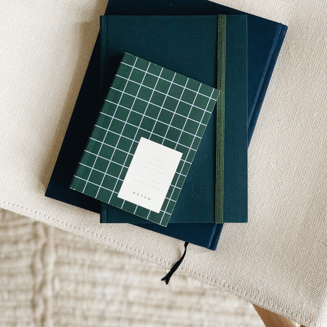 This pocket sized (approximately A6) Dark Green notebook has 160 pages of high-quality lined paper leaving space for ideas, to do lists and notes on the go.