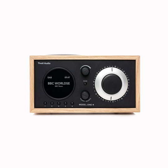 The Model One+ offers a sophisticated blend of classic design and modern audio technology, perfectly suited for any setting. This versatile table radio provides comprehensive listening options, including crystal-clear DAB/DAB+ digital radio, traditional FM, and convenient Bluetooth connectivity for wireless streaming.