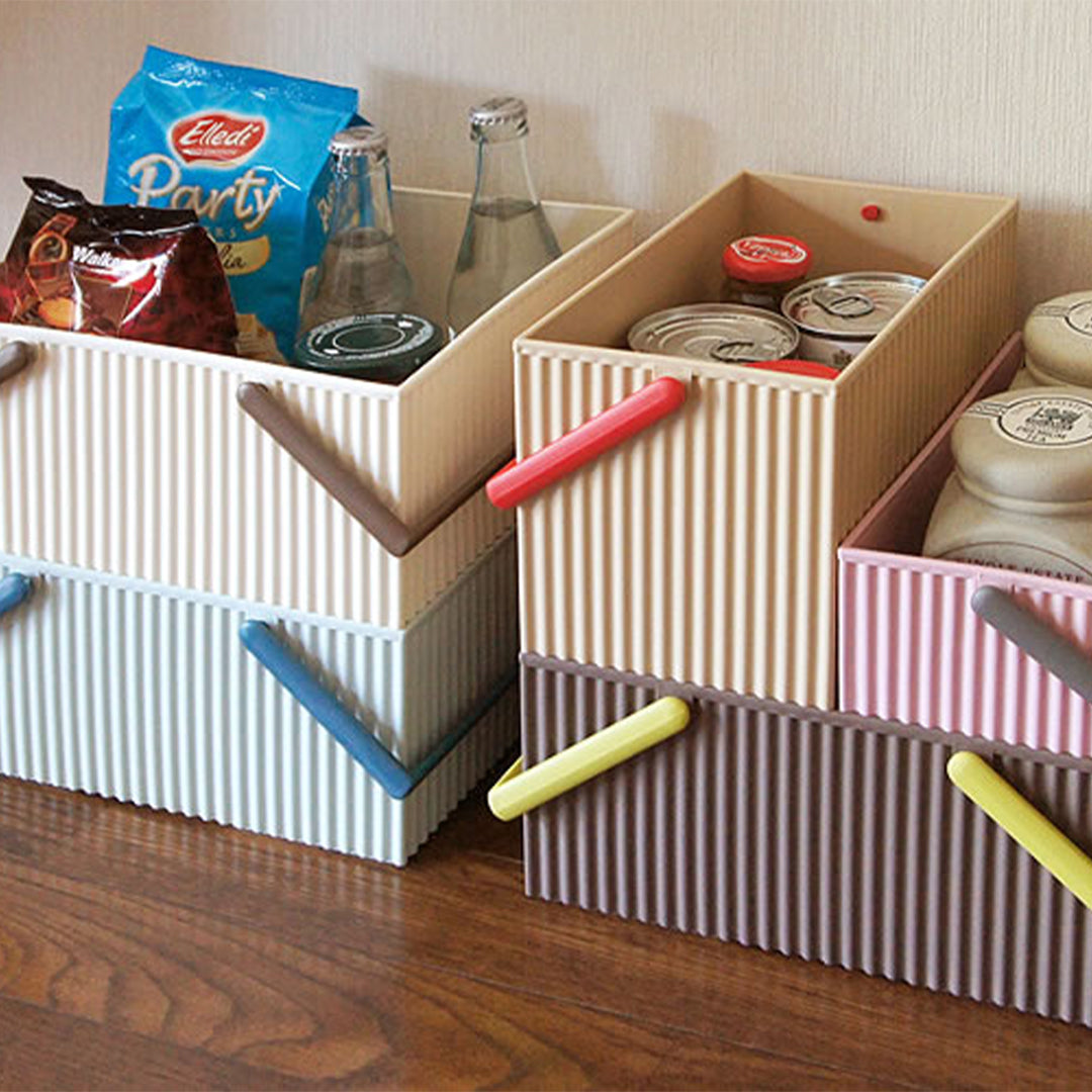Omnioffre is a range of stylish Japanese stackable storage boxes with colour coordinated carry handles.