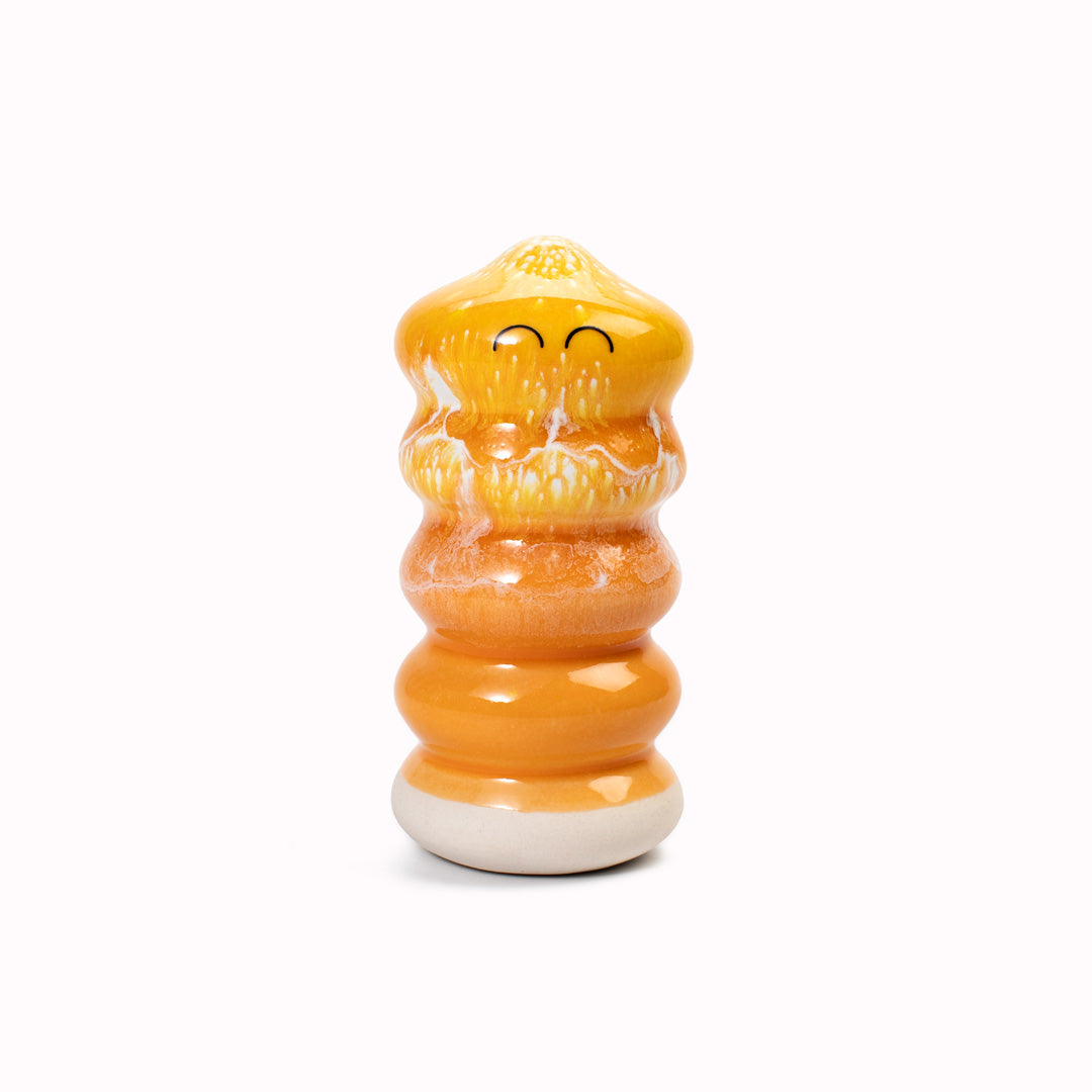 Meet Buru! Buru is a ridged cylinde shaped, hand glazed ceramic figurine created as a close relative of the classic Arhoj Ghost.
