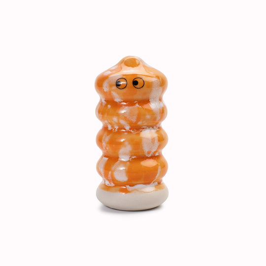 Meet Buru! Buru is a ridged cylinde shaped, hand glazed ceramic figurine created as a close relative of the classic Arhoj Ghost.