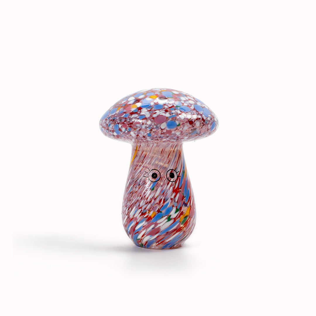 Shroom Crystal Blob is formed by dipping and/or rolling molten (hot!) clear glass into smaller chunks of brightly coloured glass droplets, then expertly shaping into weird and wonderful forms.