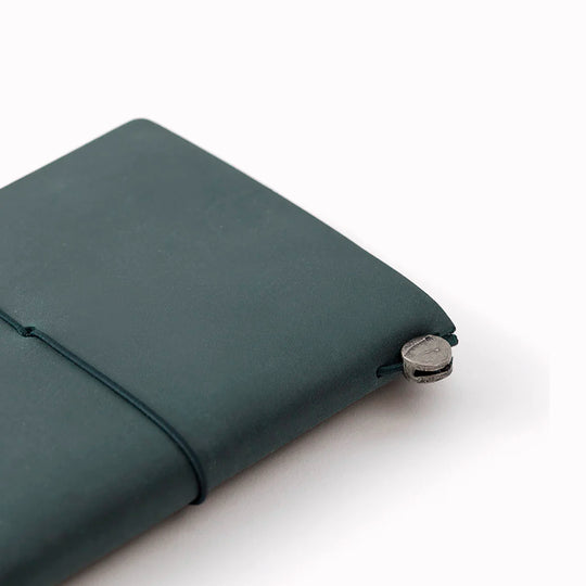 The Traveler's Notebook - Passport Size is a compact, passport‑sized notebook system built for personal organisation, journaling and creative planning. It pairs a handmade cowhide leather cover from Thailand with a blank MD paper insert crafted in Japan