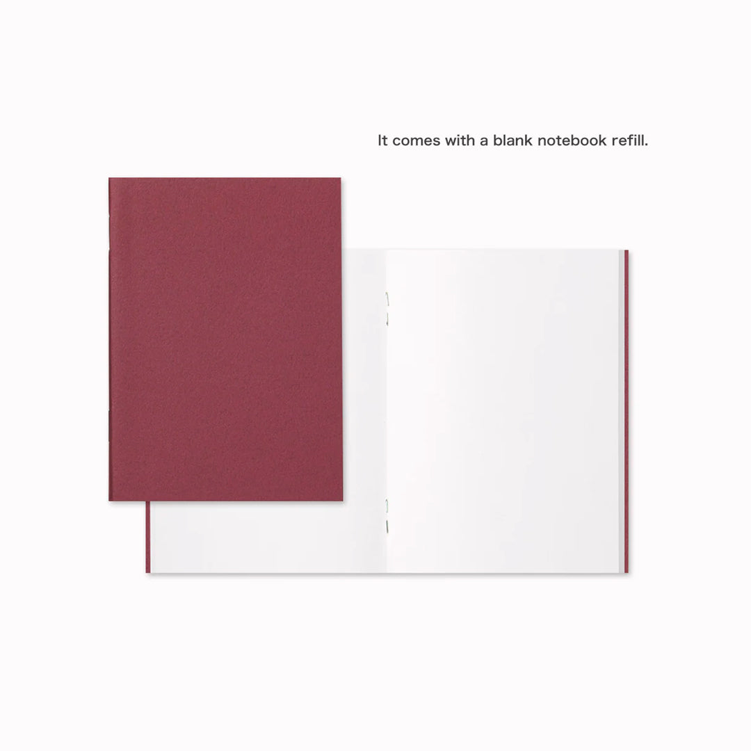 The Traveler's Notebook - Passport Size is a compact, passport‑sized notebook system built for personal organisation, journaling and creative planning. It pairs a handmade cowhide leather cover from Thailand with a blank MD paper insert crafted in Japan
