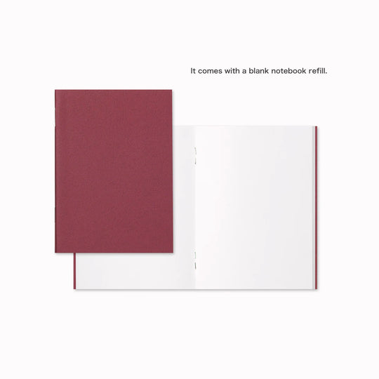 The Traveler's Notebook - Passport Size is a compact, passport‑sized notebook system built for personal organisation, journaling and creative planning. It pairs a handmade cowhide leather cover from Thailand with a blank MD paper insert crafted in Japan